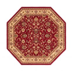 Octagon shaped maroon rug with flower design