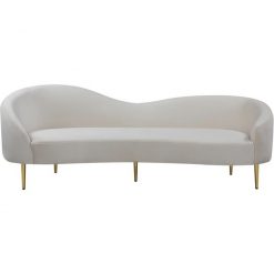Contemporary sofa in cream with velvet fabric. Curvy wave along the back