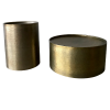 Two gold hammered tables - one a taller side table, one a lower coffee table
