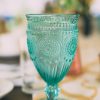 Vintage inspired teal goblet on a table