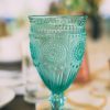 Vintage inspired teal goblet on a table