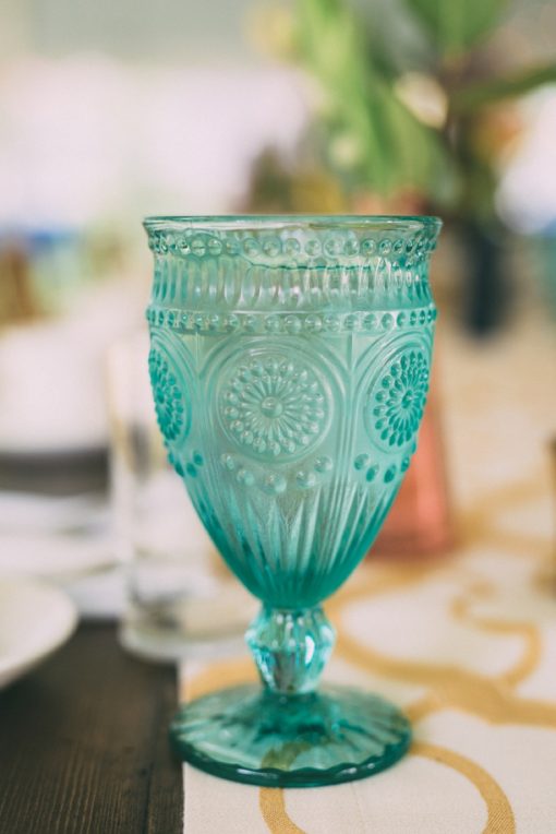 Vintage inspired teal goblet on a table