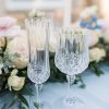 1 crystal cut champagne flute with matching crystal wine glass