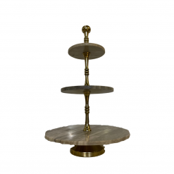 3 tiered marble cake stand with a brown/gray marble and gold metal post in the middle
