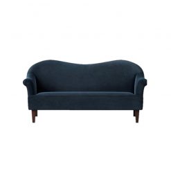 Navy blue velvet sofa with a wavy back and wooden legs