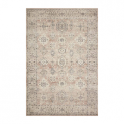 Area rug with soft pink dues in the small repeating medallion deisgn.