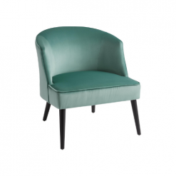 Sea foam green velvet chair with rounded back and dark wood legs.