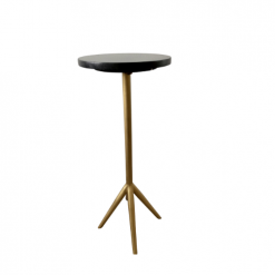 Skinny accent table with gold tripod legs that feed into 1 tall pole with a black marble top.