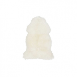 Furry fake white lambskin rug in the shape of a lamb's hide.