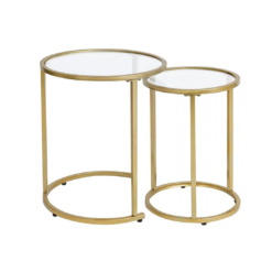 Two minimalist nesting gold side tables. Circular top with gold lining and glass top. 3 gold legs down to the base, which is round.