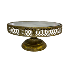 Round cake gold stand with a lattice edge and a mirror top.