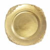 Round gold charger with ornate detailing on 4 areas near corners