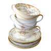 Stacked teacups/saucers.