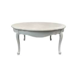 White round vintage coffee table with ornate legs.