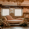 Soft pink fainting sofa with large florals at the North Church Venue in Muncie
