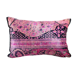 Shades of pink in whimsical curvy designs in a rectangular pillow