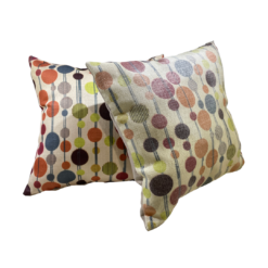 Two Square pillows with polka dots of multicolors - orange, lime green, navy, purple. Colorful lines connect the dots in vertical lines