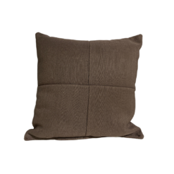 Square brown pillow with stitching down the middle from top to bottom and left to right, meeting in the middle.