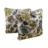 White square pillow with big bold florals and leaves in olive, green, light blue, and brown