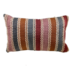 Rectangular pillow with bold stripes in pink, orange, blue, and burgandy