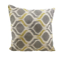 Beige square pillow with gray shapes and gray with yellow lines in between the shapes
