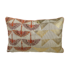 Rectangular pillow with gold shapes on the right and abstract bird designs on the left.