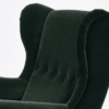 Close up of curves at top and button detailing in the middle of the back of the chair