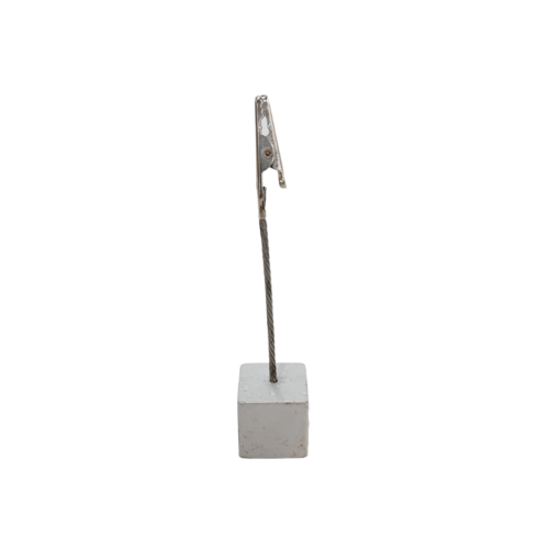 Silver. Square cube bottom with silver wire coming straight from the middle with a clip on the end to hold table numbers, seating assignments or food.