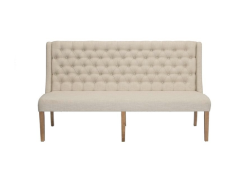 6 foot long armless loveseat with a highback in beige fabric with button tufts on the back.