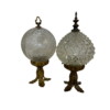 Pair of vintage decorative table top globes. Brass base with cut glass top and brass decorative top.