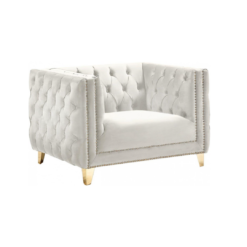 Side view of cream / white velvet square oversized chair with button tufted sides and back, gold nailhead trim and gold legs.