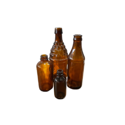 4 Vintage mismatched brown glass bottles of various sizes