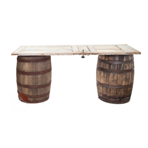 Vintage barrels with a white door on top creating a table