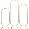 Set of 3 gold freestanding ovals in different heights.