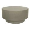 Top view of the Monolith Coffee Table showcasing its sleek round shape and gray concrete finish.