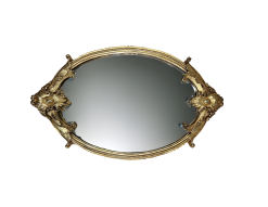 Top view of mirror tray with intricate gold trim.