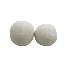 Cream colored plush spherical pillow set
